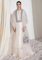 Woman wearing ivory silk sharara suit with crystal embellished dupatta - Aatish