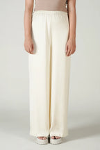 Burnt Orange Top with Ivory Trousers