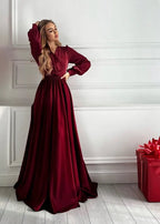 Long sleeve wine red evening gown flowing skirt view
