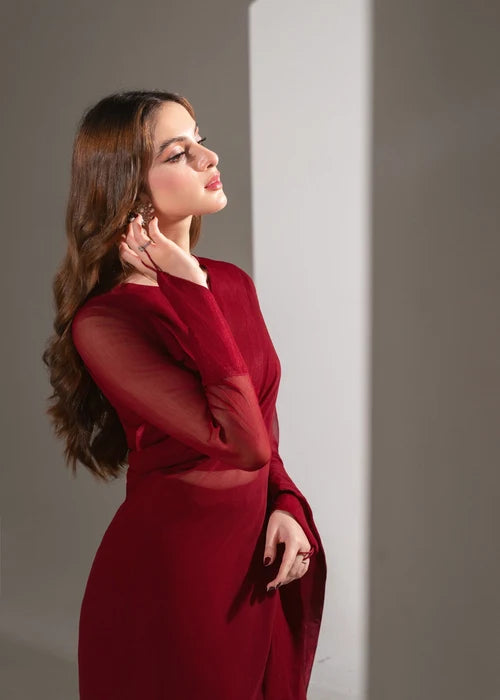 Elegant burgundy evening gown flowing sleeve detail