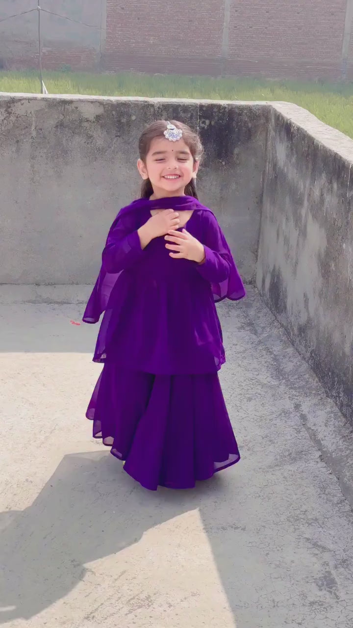 Girl wearing purple tiered sharara set with matching dupatta - Aatish Kids