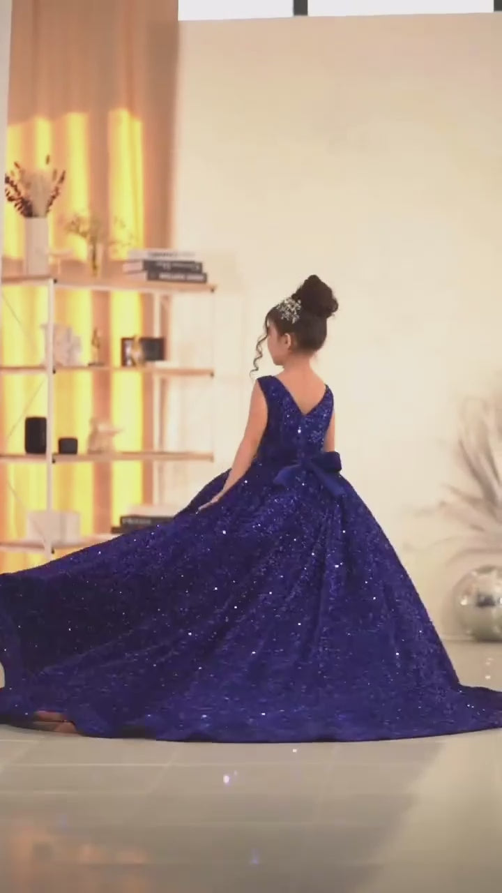 Girl wearing royal blue sequin ball gown with train - Aatish Kids